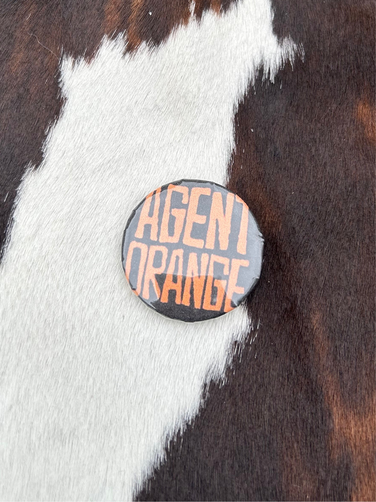 Agent orange pin